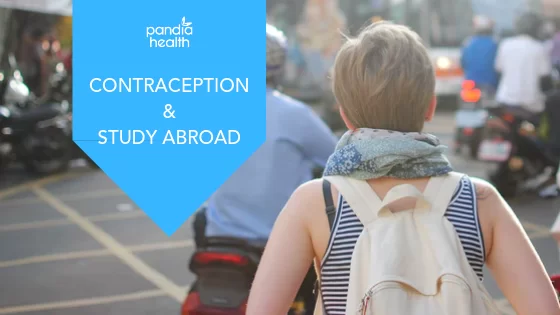 Student with backpack walking on street while studying abroad