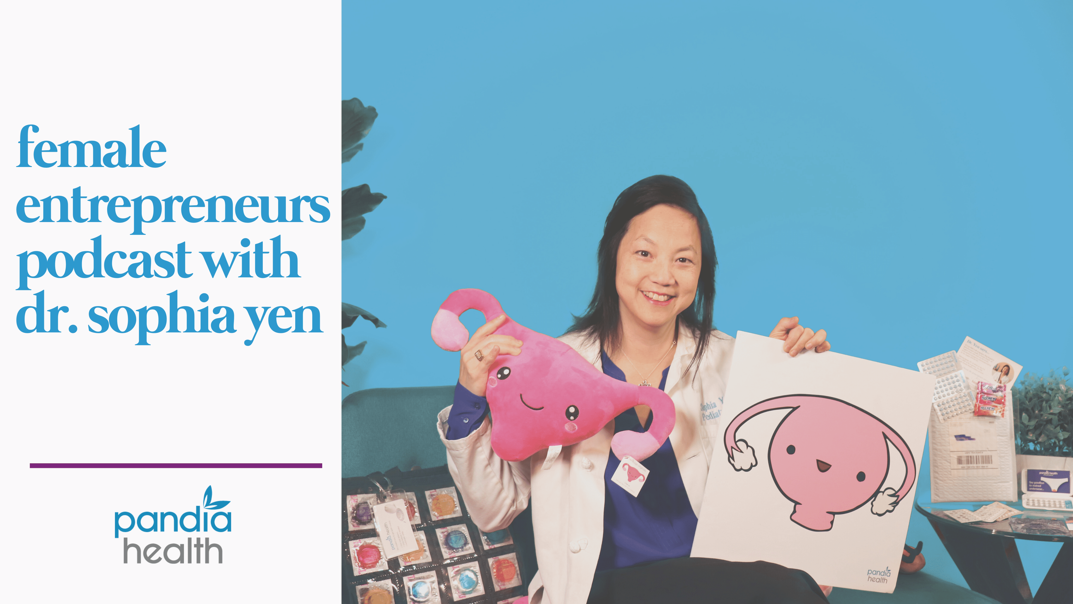 dr. sophia yen holding a pink uterus stuffed animal in one hand and white shirt with uterus on it in the other hand, smiling sitting on couch, condom bag next to her, against a blue background