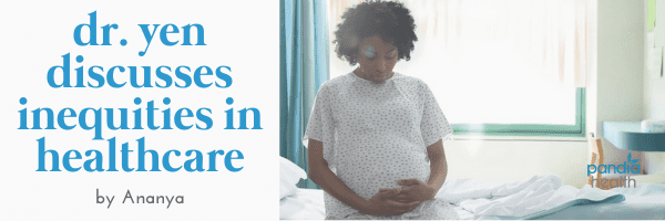 pregnant Black woman in hospital holding her belly